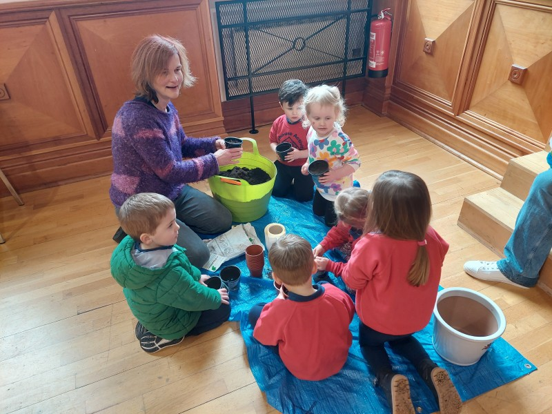Planting seeds in Coleraine during the Playful Museums Festival.