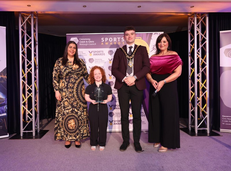 Rabab Flack representative from award sponsor Causeway Clear Ears, with Mayor of Causeway Coast and Glens, Councillor Ciarán McQuillan, Denise Watson and ‘Disability Sport’ winner Dearhbaile Brady.