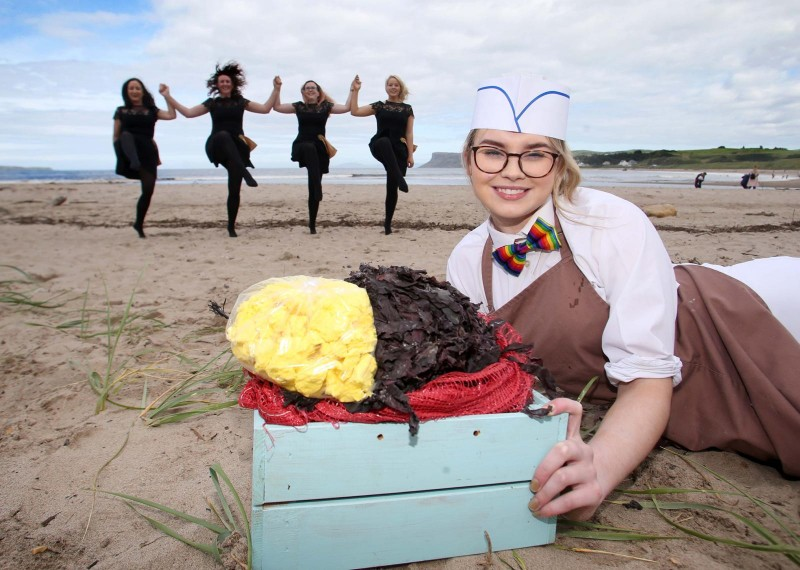 McQuillan dancers Paula Reid, Deirdre Goodlad, Lorna Dallat and Cealach Lavelle practice their steps in the shadow of Fairhead on Ballycastle beach ahead of the Ould Lammas Fair which takes place in the town from Saturday 24th August - Tuesday 27th August as Niamh Gamble showcases the event’s traditional delicacies of Yellowman and dulse.