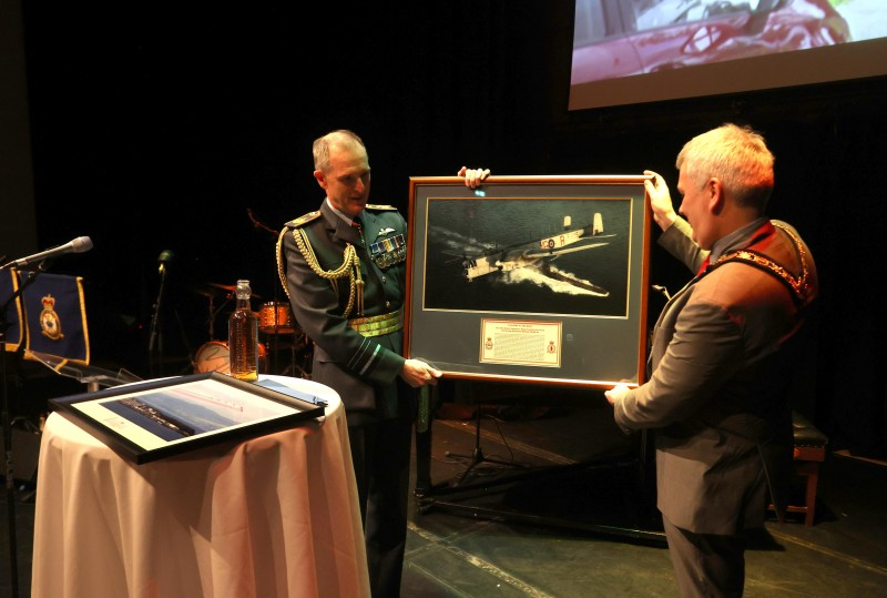 A gift is presented to the Mayor, Councillor Richard Holmes, in recognition of the Freedom of the Borough award.