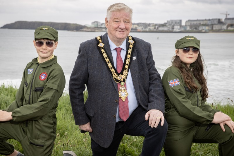 Mayor Cllr Stephen Callaghan pictured alongside Portrush Primary School pupils Leah and Alfie