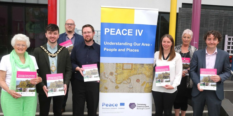 The Mayor of Causeway Coast and Glens Borough Council Councillor Sean Bateson pictured with Patricia Crossley, Vice Chair of the PEACE IV Partnership, Jonathan Adams, Community Access Worker, RNIB Northern Ireland, Dr Nicholas Wright, Museum Services Community Engagement Officer, Stephanie Hilditch, Manager of Glenshane Care Association, Joanne Honeyford, PEACE IV Project Officer and Andrew King, Special EU Programmes Body at the launch of the new  Causeway Coast and Glens Accessible Heritage Guide.