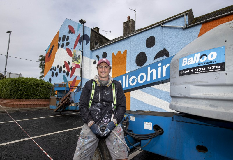 Artist Shane O’Driscoll works on his creation at Church Street Car Park in Ballymoney.