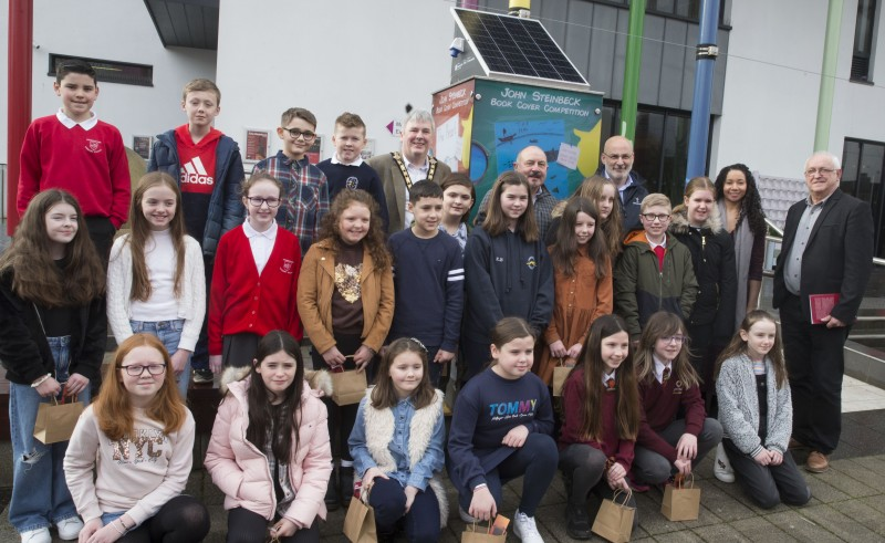 The winners of the John Steinbeck Book Cover Competition pictured with the Mayor of Causeway Coast and Glens Borough Council Councillor Richard Holmes.