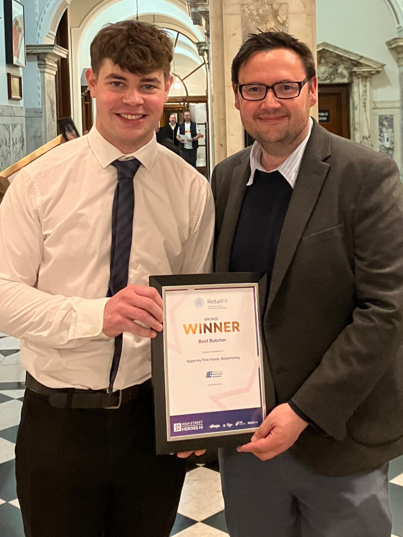Councillor Lee Kane with a representative from Apperley’s Fine Foods, who received a bronze award at the 2024 High Street Hero Northern Ireland Awards held in Belfast City Hall.
