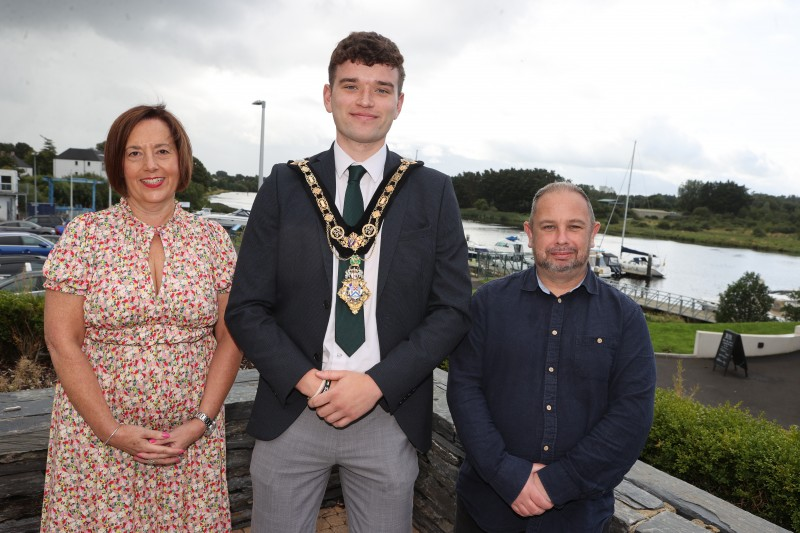 Mayor of Causeway Coast and Glens, Councillor Ciarán McQuillan with Gareth Dorman and Sally Kelly, Northern Ireland Housing Executive, Street Soccer NI tournament sponsors.