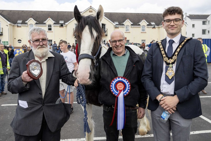 Mayor of Causeway Coast and Glens, Councillor Ciarán McQuillan pictured with the Lammas Fair Champions at the prize giving for the Heavy Horse Show on Saturday 24th August.