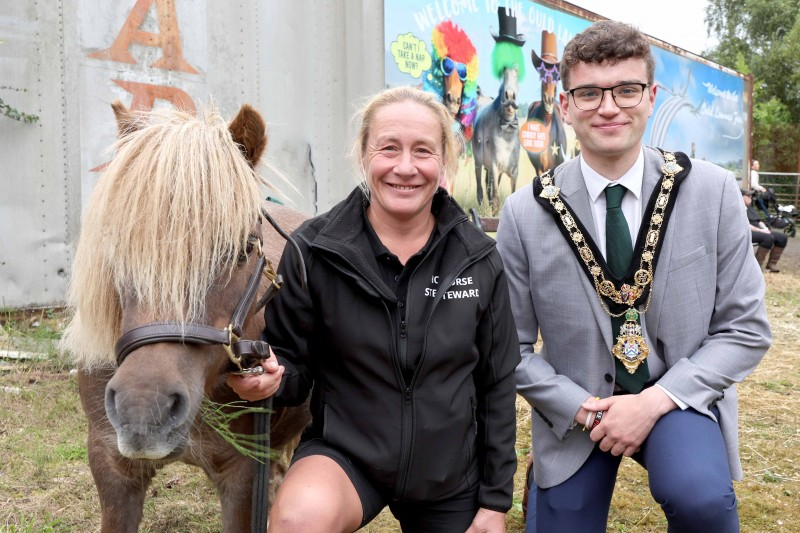 Causeway Coast and Glens Mayor Councillor Ciarán McQuillan and Melissa Lemon, Chief Horse Steward with Topper, pictured at the traditional horse fair on Fairhill Street.