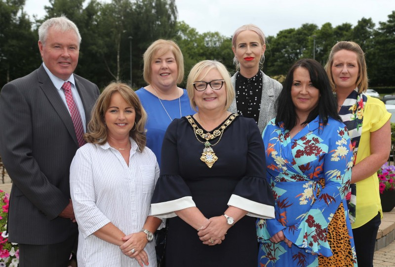 Staff and volunteers from Limavady Community Development Initiative pictured with the Mayor of Causeway Coast and Glens Borough Council Councillor Brenda Chivers along with Elaine Downey and Harry Armstrong from Department for Communities who part fund the advice service provision.