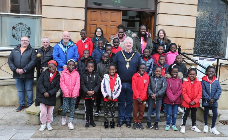 Mayor of Causeway Coast and Glens, Councillor Steven Callaghan with Abanna New Life Choir at a civic reception at Coleraine Town Hall.