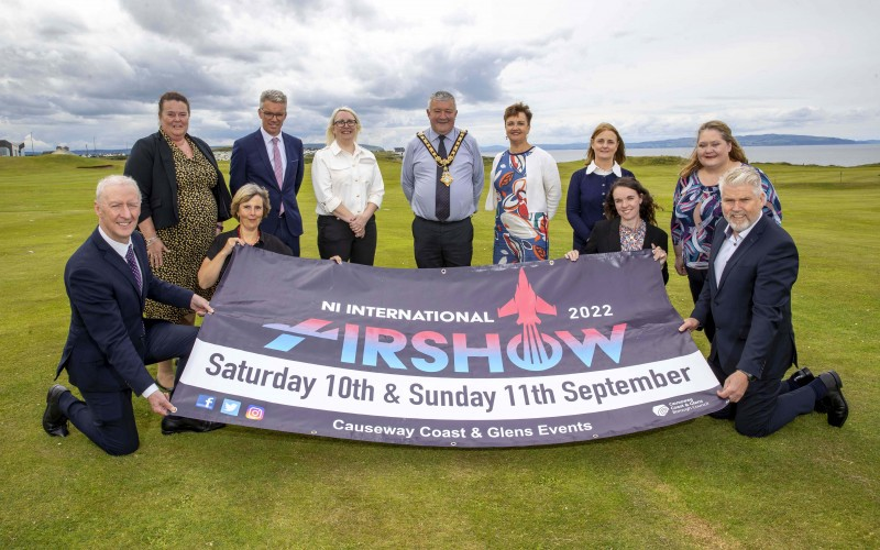 The Mayor of Causeway Coast and Glens Borough Council Councillor Ivor Wallace pictured in Portrush as part of the countdown to the NI International Air Show which takes place on September 10th and 11th with front row, Sir Michael J Ryan CBE from Spirit AeroSystems, new joint title sponsor, Gillian Gregg from Pulsar, Laura Hamilton and Lyle Creighton from Thales (joint title sponsor), and back row, Natasha Garrott (Portrush Atlantic Hotel), Kevin McNamee (Denroy Plastics Ltd), Alana Colenso from Thales (joint title sponsor), Grainne McVeigh (Invest NI), Noeleen McKillop and Catherine Deery, representing The Honourable The Irish Society.