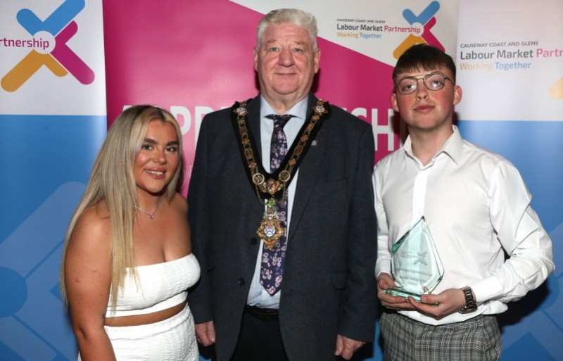 Mayor of Causeway Coast and Glens, Councillor Steven Callaghan with Shea McIlwee and guest