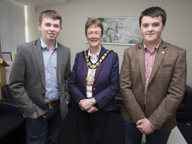Conor McCafferty and Keelan Clarke from Armoy Young Farmers’ Club pictured with the Mayor of Causeway Coast and Glens Borough Council, Councillor Joan Baird OBE.