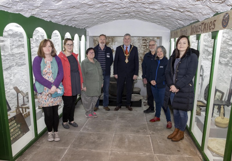 The Mayor of Causeway Coast and Glens Borough Council Councillor Richard Holmes pictured with Friends of Ballycastle Museum volunteers