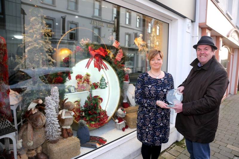 The Style Loft on Main Street in Ballymoney was the winner of Causeway Coast and Glens Borough Council’s Christmas window competition in Ballymoney. Lynda McHenry is pictured receiving the award from Town and Village Officer Shaun Kennedy.