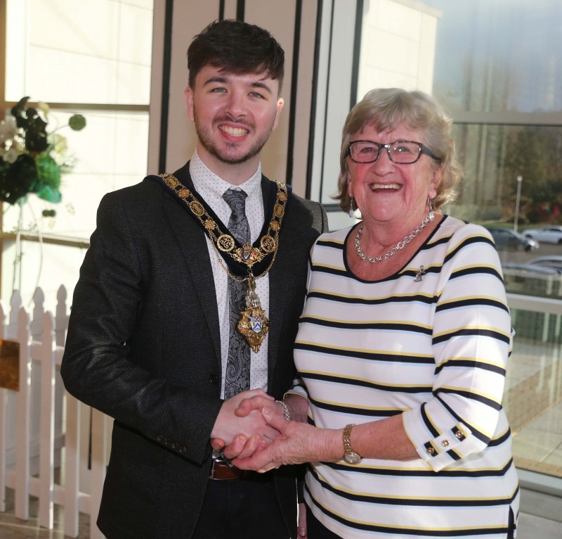 Jean Caulfield MBE, the long-serving Chairperson of Castlerock Wednesday Club pictured with the Mayor of Causeway Coast and Glens Borough Council Councillor Sean Bateson at a reception for club members held in Cloonavin.