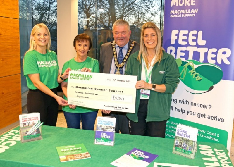 Jodie McAneaney, Macmillan Relationship Fundraising Manager, Macmillan Move More participant Margaret Brown, the Mayor of Causeway Coast and Glens Borough Council, Councillor Ivor Wallace and Macmillan Move More Co-ordinator, Catherine King pictured with a cheque for £5347 which was raised at recent fundraising coffee mornings for Macmillan Cancer Support.