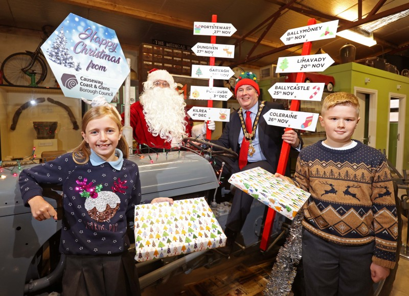 The Mayor of Causeway Coast and Glens Borough Council Councillor Richard Holmes joins Santa Claus and Garvagh Primary School pupils Reuben Catherwood and Siri McFetridge in Garvagh Museum ahead of the Christmas Cavalcade which will visit nine towns in the Borough during November and December.
