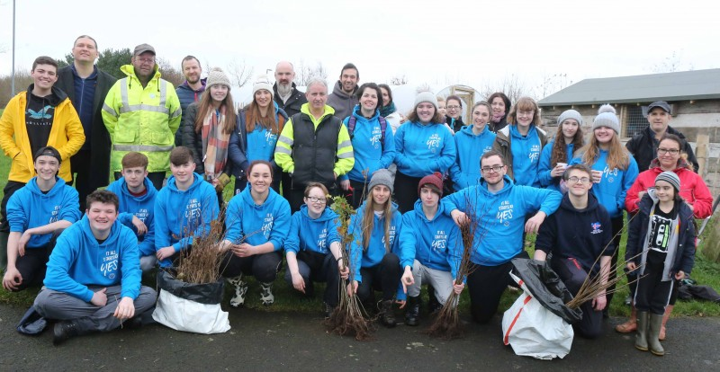 National Citizen Service participants pictured with those who took part in the InTREEgration project at the Cornfield site.