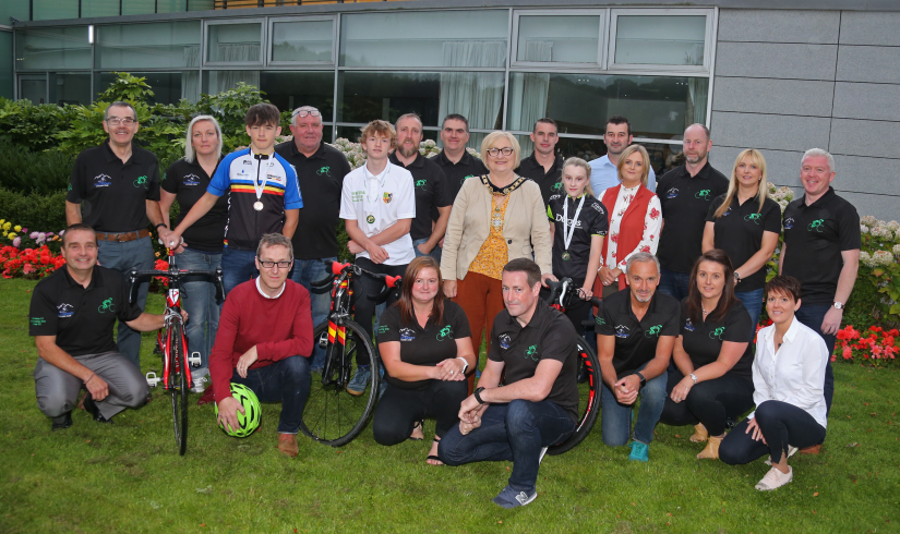 The Mayor of Causeway Coast and Glens Borough Council Councillor Brenda Chivers pictured with representatives from Ballymoney and Dunloy Cycling Clubs at the civic reception.