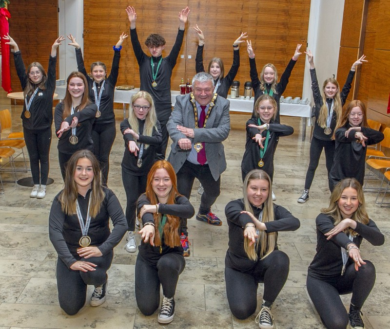 The Mayor of Causeway Coast and Glens Borough Council, Councillor Ivor Wallace, learns some moves during the reception for the OMD Dance group from Limavady.