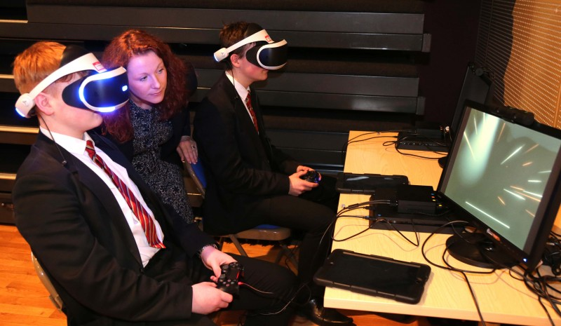 Pupils from Limavady High School pictured trying out some of the digital equipment with Bridget Mc Caughan from Causeway Coast and Glens Borough Council at the Digital Youth programme finale competition event in Roe Valley Arts and Cultural Centre.