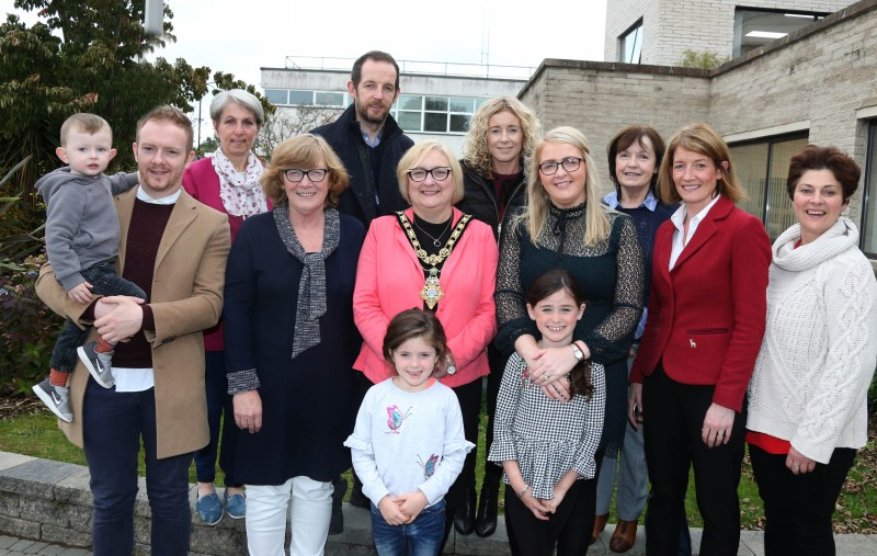The Mayor of Causeway Coast and Glens Borough Council Councillor Brenda Chivers pictured with members of Dungiven Regeneration Club at a civic reception in Limavady.