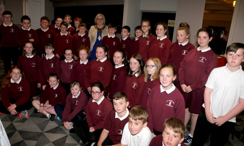 The Mayor of Causeway Coast and Glens Borough Council Councillor Brenda Chivers pictured with pupils from St Mary’s Primary School in Cushendall at the Energy Detectives celebration event.