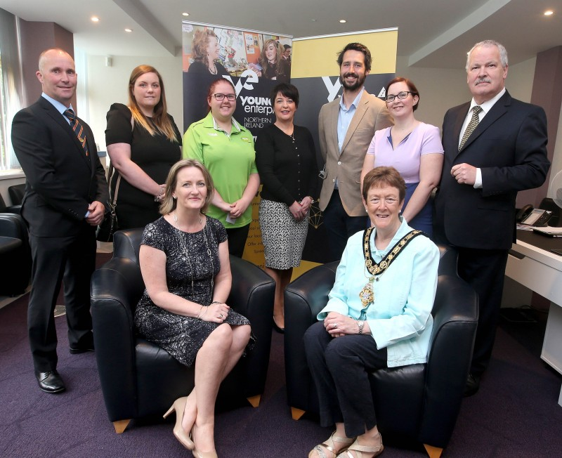 The Mayor of Causeway Coast and Glens Borough Council, Councillor Joan Baird, OBE pictured with (back row) Adrian Eakins, Michelle Eakins, Sharon Linton, Brigid Duggan, Dan Lavery, Geri Martin. Gordon Craig and (front row) Carol Fitzsimons, Young Enterprise Chief Executive.