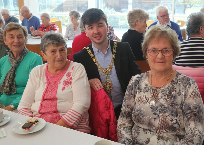 The Mayor of Causeway Coast and Glens Borough Council Councillor Sean Bateson pictured with Ballymoney Evergreen Club members Elizabeth Anderson, Peggy Brogan and Phyllis Kerr at a civic reception in Cloonavin.