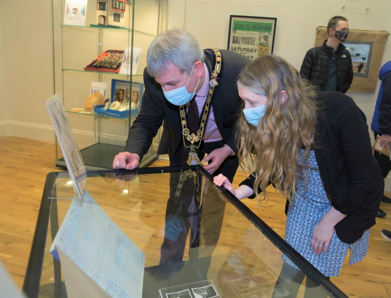 Jamie Austin from Causeway Coast and Glens Borough Council’s Museums Service and the Mayor, Councillor Richard Holmes, look at what was on the menu for pupils at Killyrammer Primary School from their 1983 Kitchen Ledger which is on display as part of the ‘100 Objects for 100 Years’ exhibition.