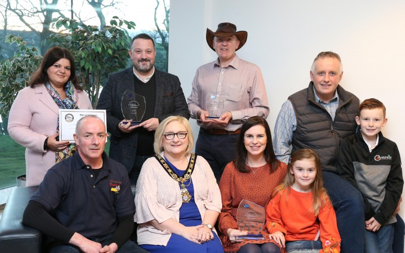 The Mayor of Causeway Coast and Glens Borough Council Councillor Brenda Chivers pictured with (back row) Daniela Morelli-Kerr and Arnaldo Morelli from Morelli’s Ice Cream, Alastair Bell from Irish Black Butter, (front row) Niall Delargy, Glenballyeamon Eggs and Richard and Leona Kane from Broighter Gold with their children Jacob and Emily.
