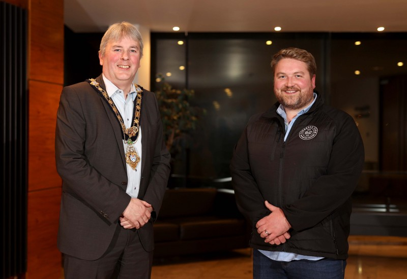 The Mayor of Causeway Coast and Glens Borough Council Councillor Richard Holmes pictured with Blas na hEireann winner Alastair Crown from Corndale Farm.
