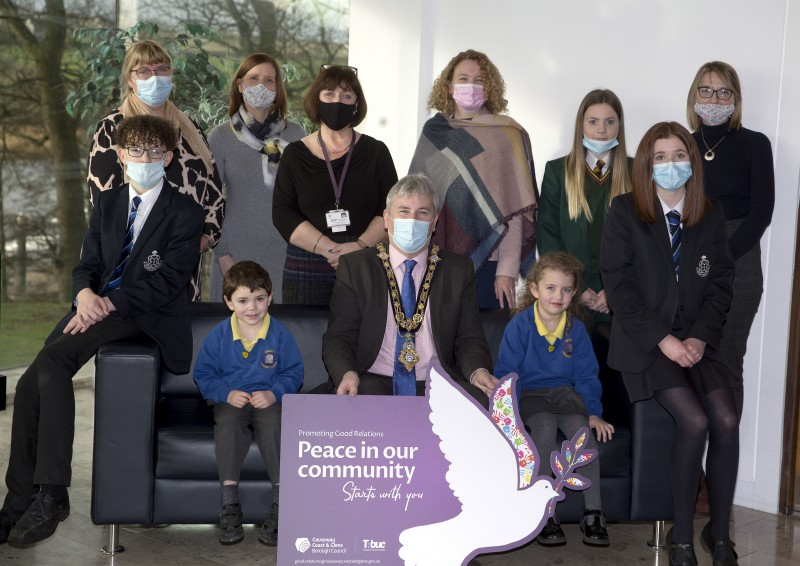 Pictured with the Mayor of Causeway Coast and Glens Borough Council Councillor Richard Holmes and Joy Wisener from Council’s Good Relations Team are Hezlett Primary School Principal Donna Winters, P1 teacher Joanne Gillespie and pupils Noah MacBruithin and Lily Lindsay, alongside St Mary’s Limavady teacher Ann-Marie Donaghy and pupil Maya Donaghy and Limavady Grammar School teacher Briege Lowth, and pupils Mia O’Brien and Xander Mullan.