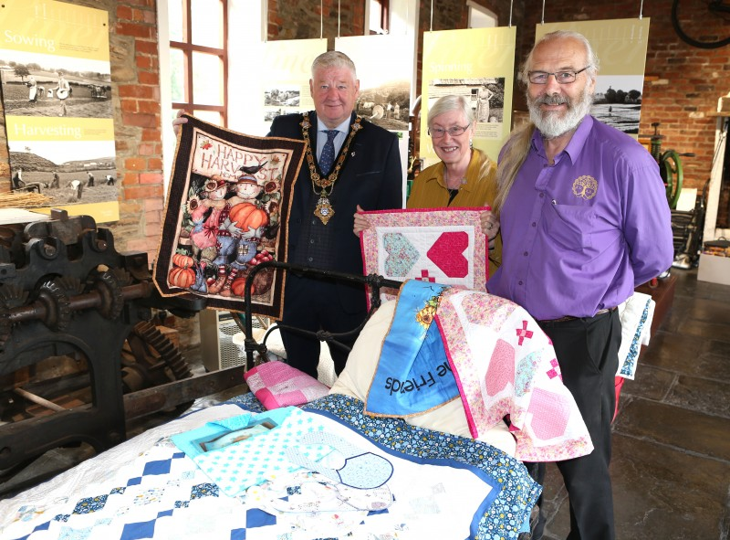 Mayor of Causeway Coast and Glens, Councillor Steven Callaghan pictured at Green Lane Museum with Betty and Matt Ferguson of Roe Valley Ancestral Researchers.