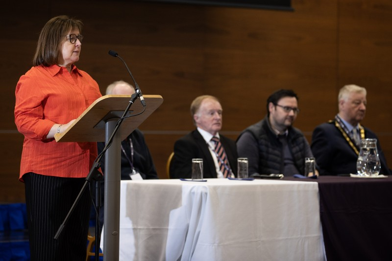 Alderman John McAuley from Democratic Unionist Party takes questions from pupils at the Pupil Voice event.