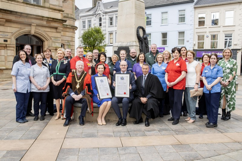 Staff representatives from Northern and Western Health Trusts who have been honoured with the Freedom of the Borough, join Mayor of Causeway Coast and Glens Councillor Steven Callaghan QPM, Jennifer Welsh, Chief Executive of the Northern Trust, Western Trust Chief Executive Neil Guckian OBE, and David Jackson, Chief Executive Causeway Coast and Glens Borough Council.