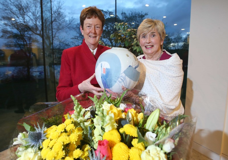 The Mayor of Causeway Coast and Glens Borough Council presents Maura Hickey with a piece of art by local ceramicist Adam Frew to mark her retirement from life as an elected member.