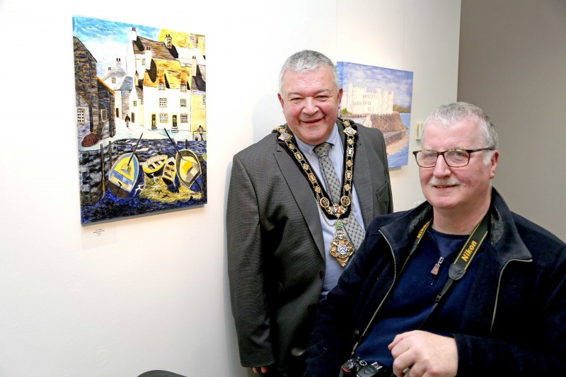 The Mayor of Causeway Coast and Glens Borough Council, Councillor Ivor Wallace, pictured at the opening of the Inside Out exhibition by the Pavestone Collective with Chris Magee