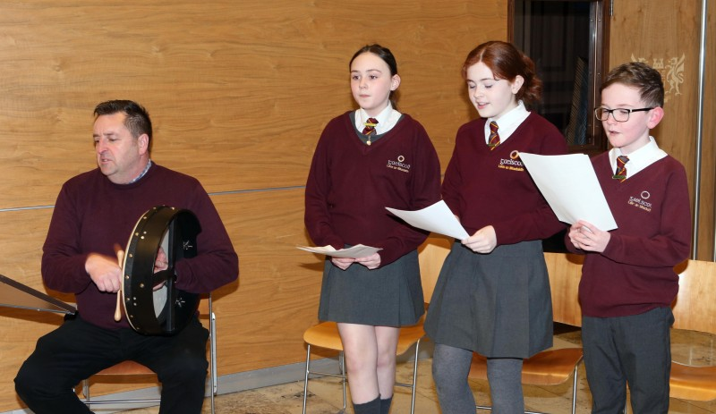 Young singers from Gaelscoil Léim An Mhadaidh perform in Cloonavin during the Irish Language Week celebration.