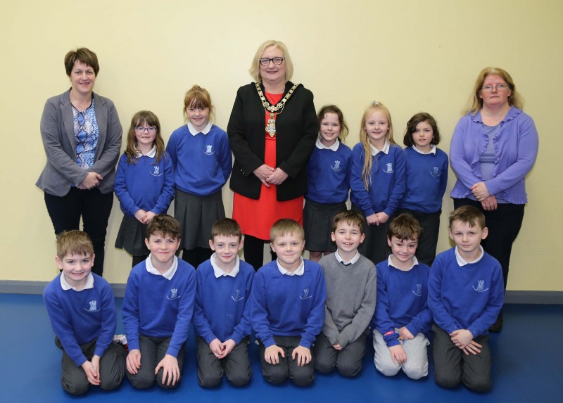 The Mayor of Causeway Coast and Glens Borough Council Councillor Brenda Chivers pictured with pupils and staff members during her visit to Gaelscoil an Chaistil in Ballycastle.
