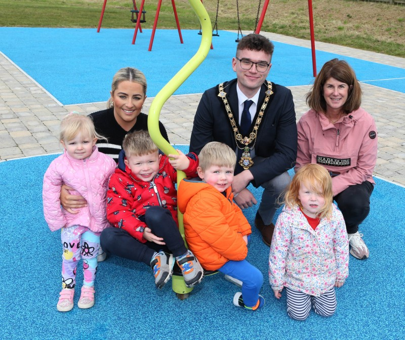 Mayor of Causeway Coast and Glens, Councillor Ciarán McQuillan pictured with local residents and families who attended the official opening of Islandmore Play Park, Portrush.