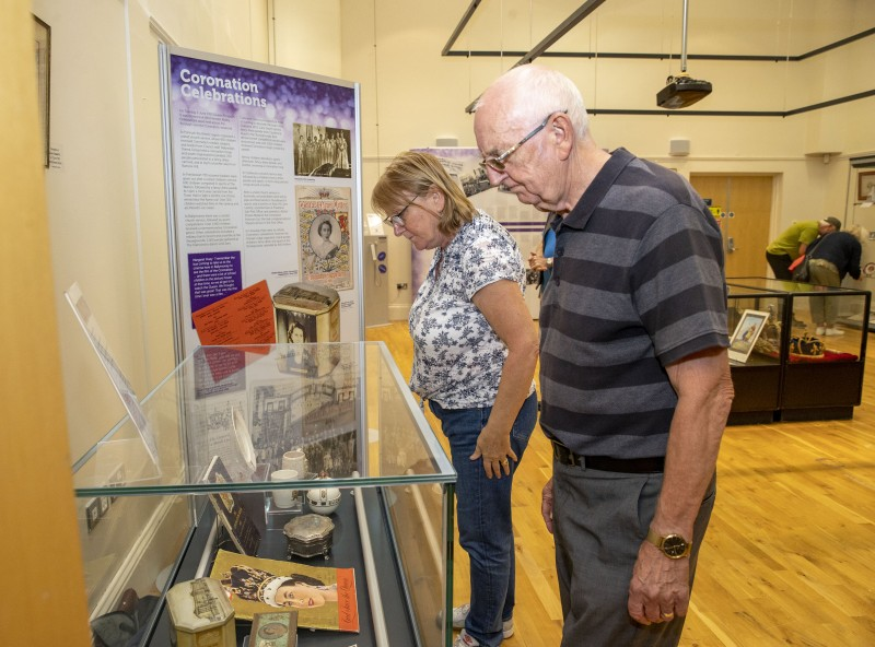 Visitors browse the ‘Community and Crown’ exhibition which is now open in Ballymoney Town Hall.