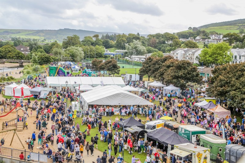 Naturally North Coast and Glens Artisan Market stalls fill the green at the Seafront in Ballycastle.