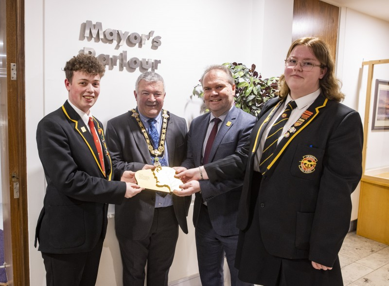 The Mayor of Causeway Coast and Glens Borough Council, Councillor Ivor Wallace, pictured with Head Teacher Darren Mornin, Head Boy Jack McCorkell and Head Girl Maddison Duff from Limavady High School, winners of the Pearson Award for Making a Difference – Secondary School of the Year in the UK.