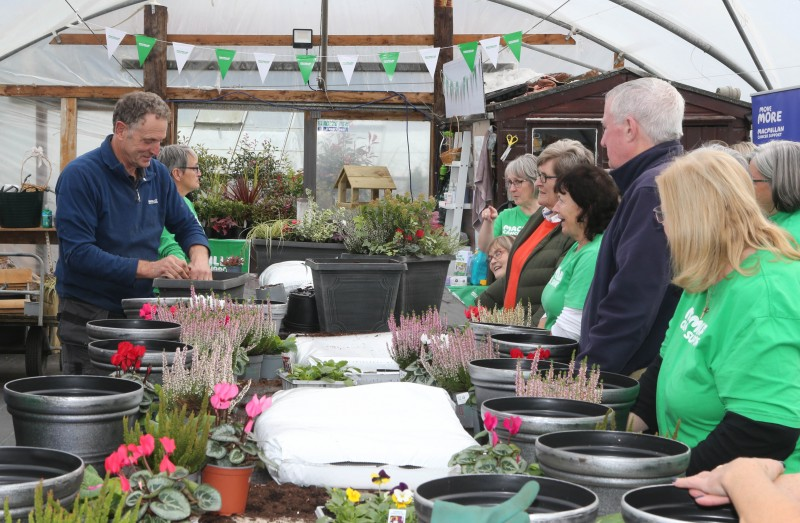 Andrew McClarty shows Move More Participants the best way to layout planters.