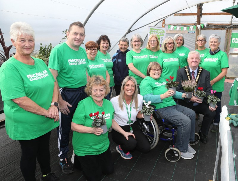 (l-r) back row -Linda McCandless, Simon Moore, Roslyn Graham, Mary McDonald, Jenny McGinn, Rosemary Iliff, Jacqueline Hamilton, Pauline McNeill, Glynis Elder, Linda McAfee & Yvonne Bloomer  (l-r) front row – Sandra Logue, Catherine King Move More Coordinator, Estelle McKeegan, Mayor of Causeway Coast and Glens, Councillor Steven Callaghan. Pictured at the ‘Feel-Good Gardening’ project.