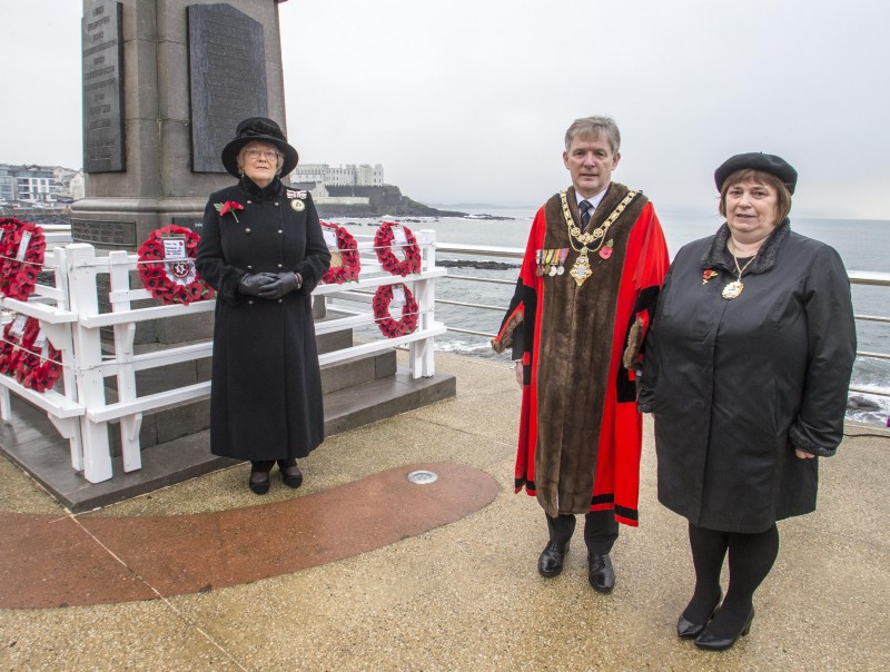 Mayor of Causeway Coast and Glens Borough Council, Alderman Mark Fielding and his wife Phyllis, at the War Memorial in Portstewart on Remembrance Sunday​ with Lady Karen Girvan, Deputy Lord Lieutenant of County Londonderry