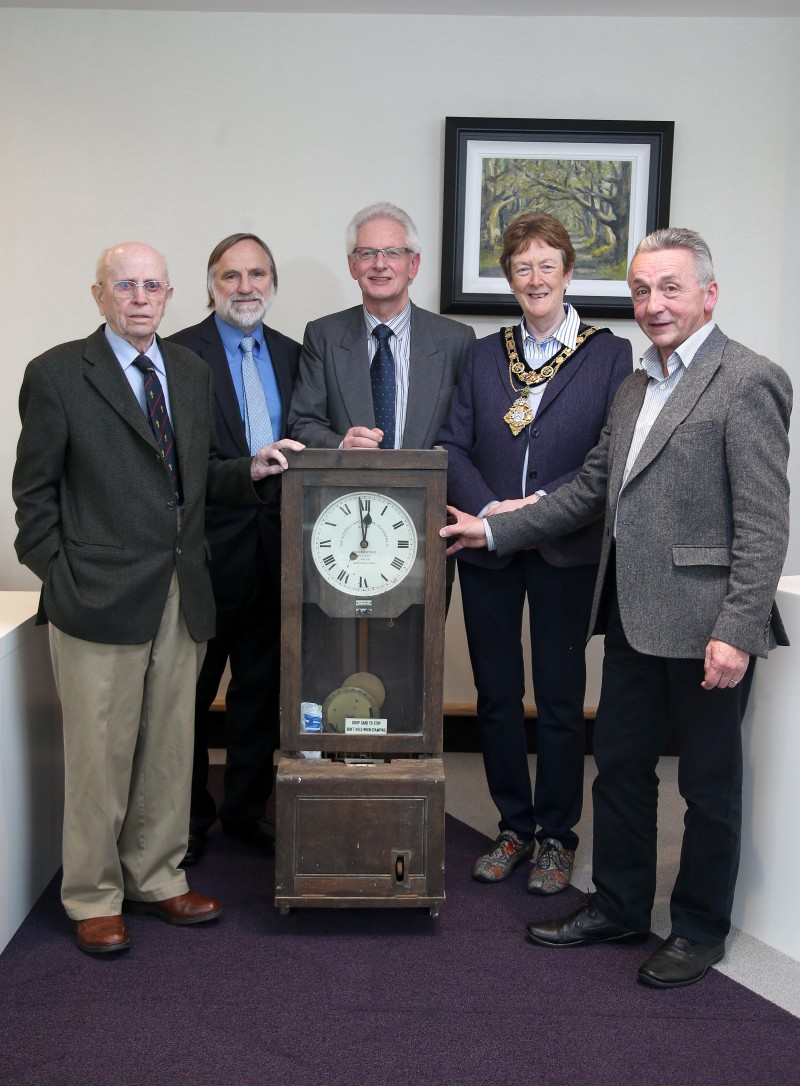 99-year-old Norman Irwin, John Ward, Alan Lilley, the Mayor of Causeway Coast and Glens Borough Council Councillor Joan Baird OBE and Councillor William McCandless pictured with the clock in the Mayor's Parlour.