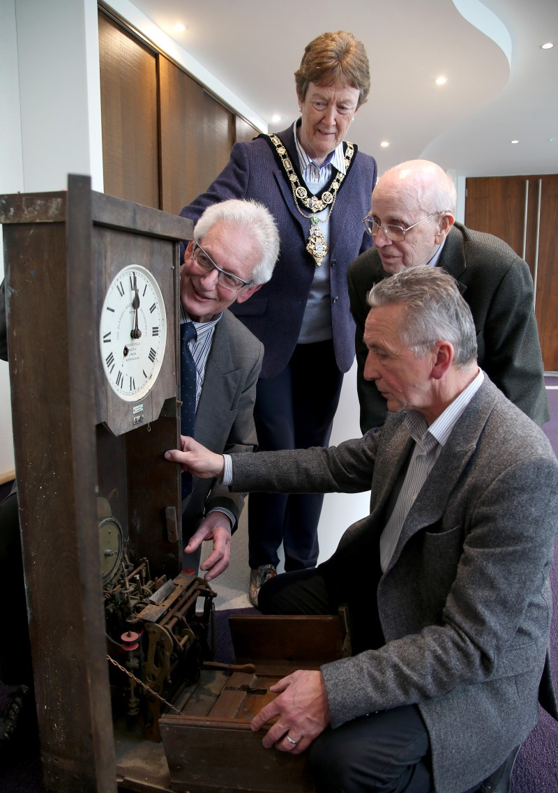 Having a look at the inner workings of the clock are Councillor William McCandless, Alan Lilley, Norman Irwin and the Mayor of Causeway Coast and Glens Borough Council Councillor Joan Baird OBE.